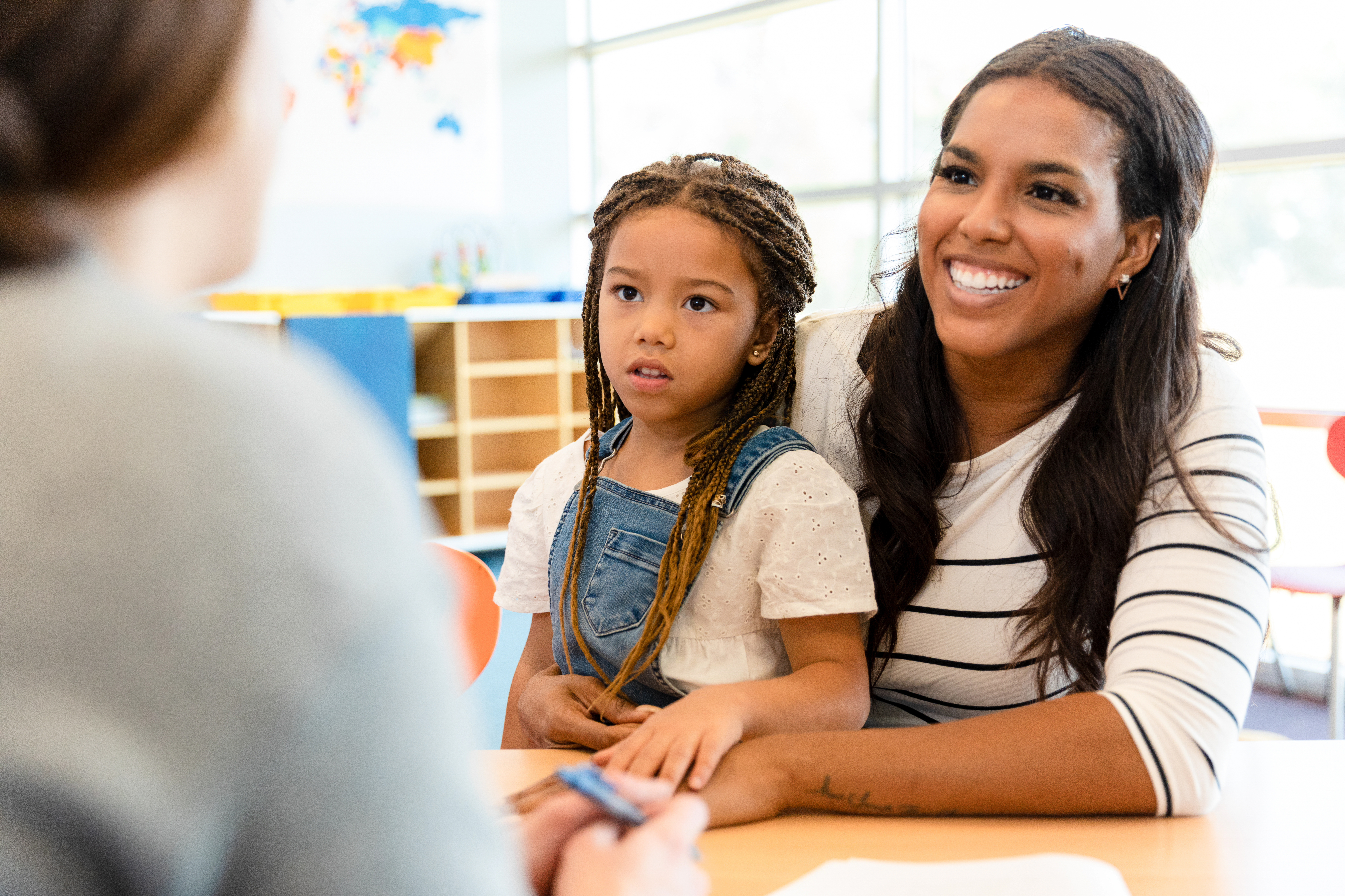 Mother and daughter at Parent-teacher conference