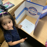 A young student does a budgeting activity.