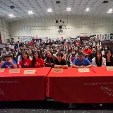 City Council Member Linda Lee visits with middle school students.