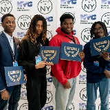 Four student filmmakers pose with their certificates.