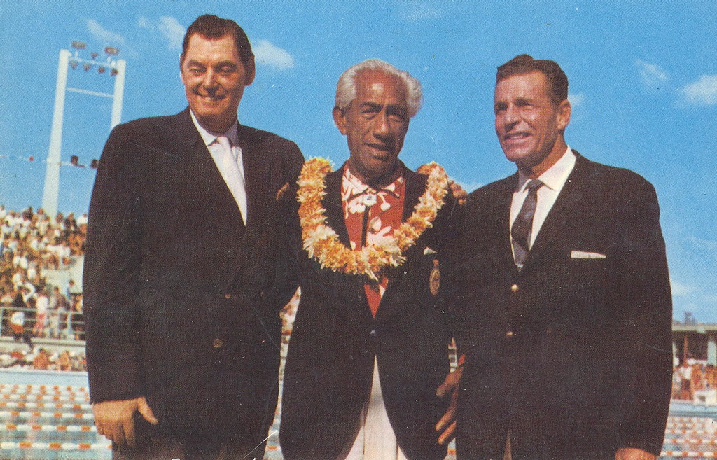 Johnny Weissmuller, Duke Kahanamoku, and Buster Crabbe during their induction into the inaugural class of the Swimming Hall of Fame.