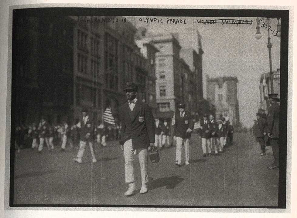 Duke Kahanamoku marching in the ticker tape parade held in Manhattan after the 1920 Antwerp Olympic games.