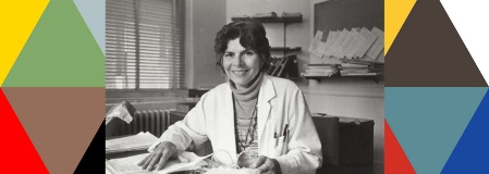 Dr. Helen Rodriguez-Trias holding a newborn baby in a hospital in Puerto Rico