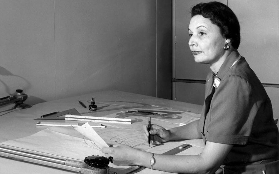 Mary Ross Working at Drafting Desk Mary G. Ross sitting at a drafting desk ready to draw.
