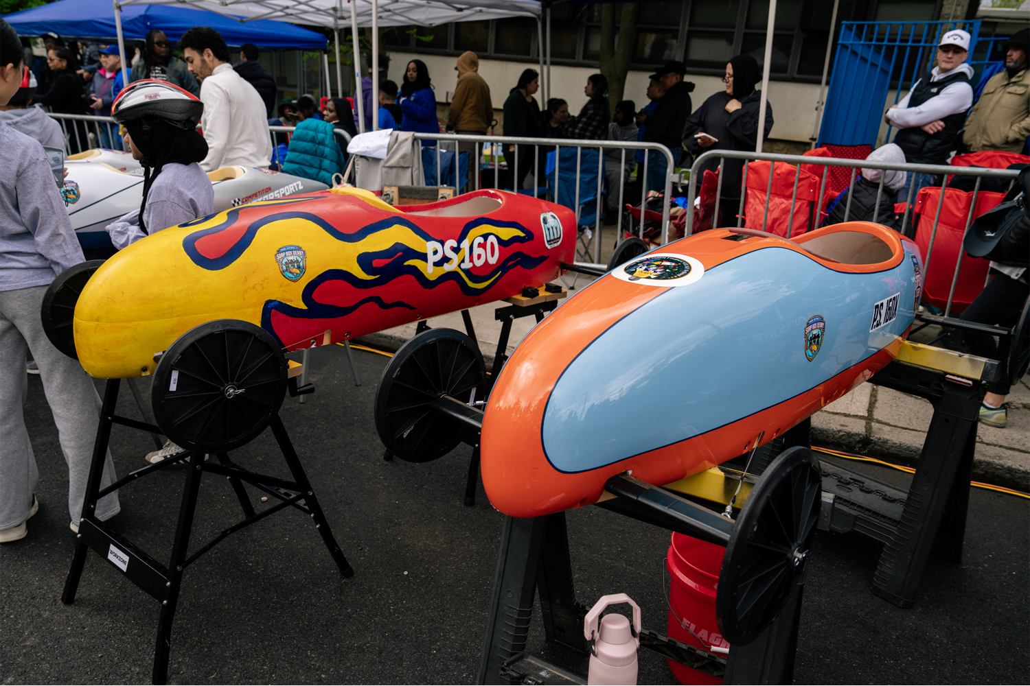 Wide view shot of two soap box cars built by PS 160 students