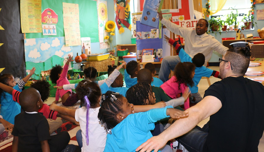 Read aloud teacher and students playing airplanes