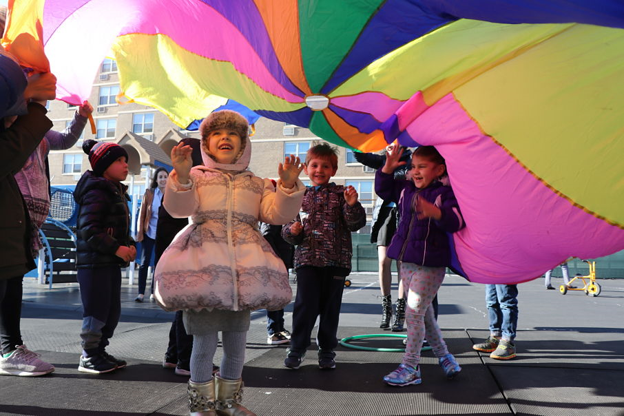 Children play together during outdoor recess. 