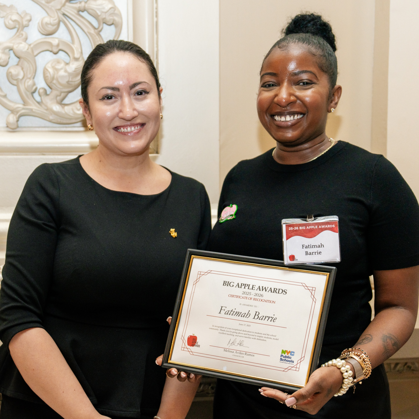 2025 Big Apple Award winner Fatima Barrie receives her certificate from Chancellor Aviles-Ramos
