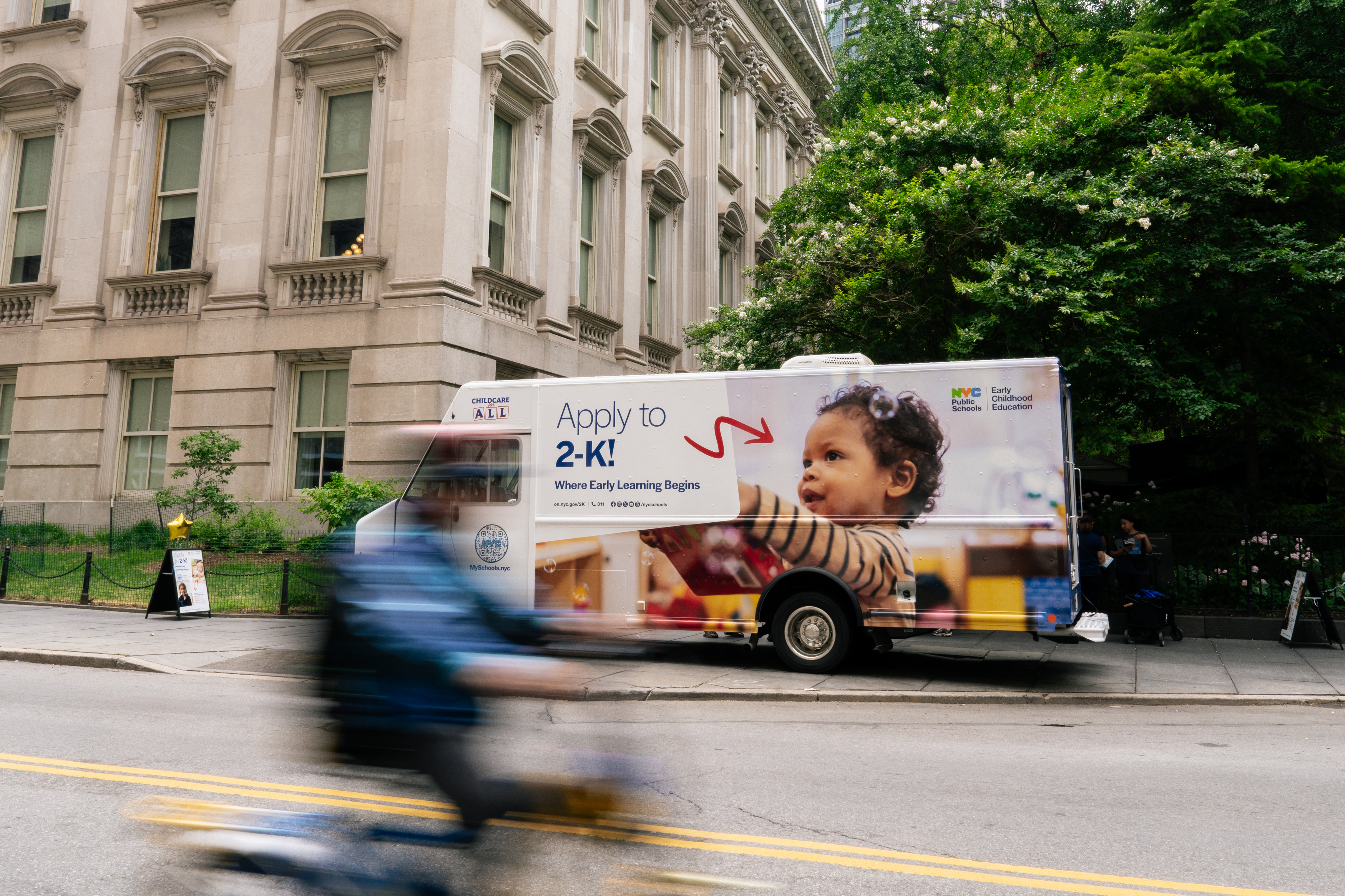 A 2-K Treat Truck parked in front of Tweed Courthouse