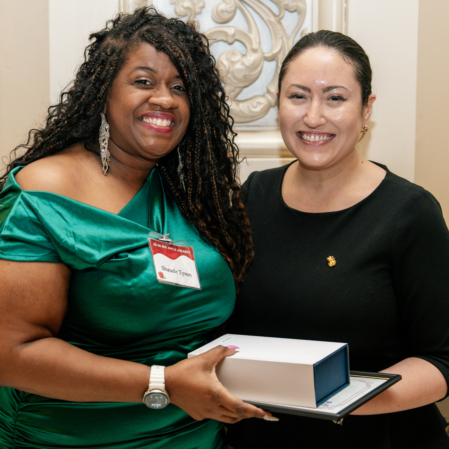 2025 Big Apple Award winner Shaude Tyson receives her awards from Chancellor Aviles-Ramos