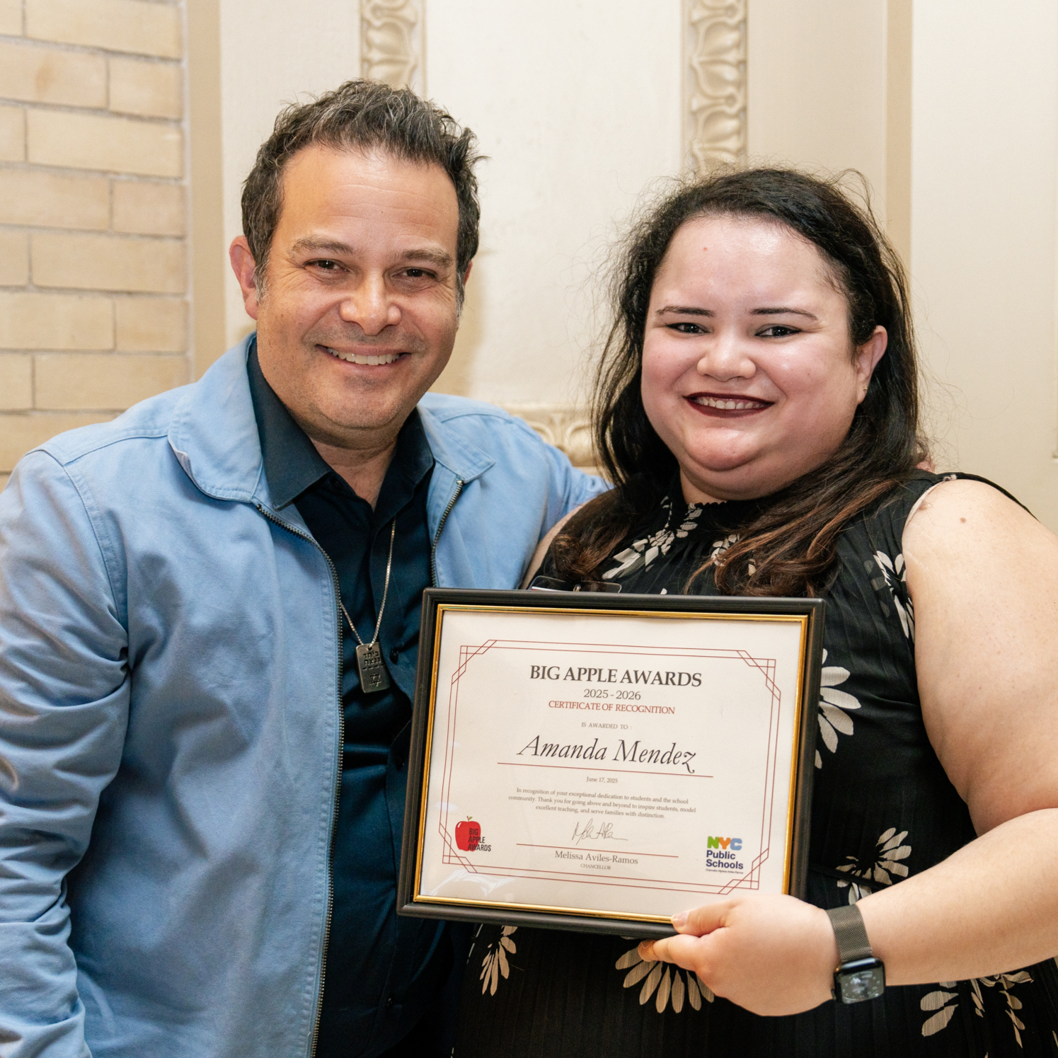 2025 Big Apple Award winner Amanda Mendez receives her certificate
