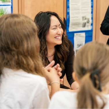 Chancellor Aviles-Ramos laughs with students