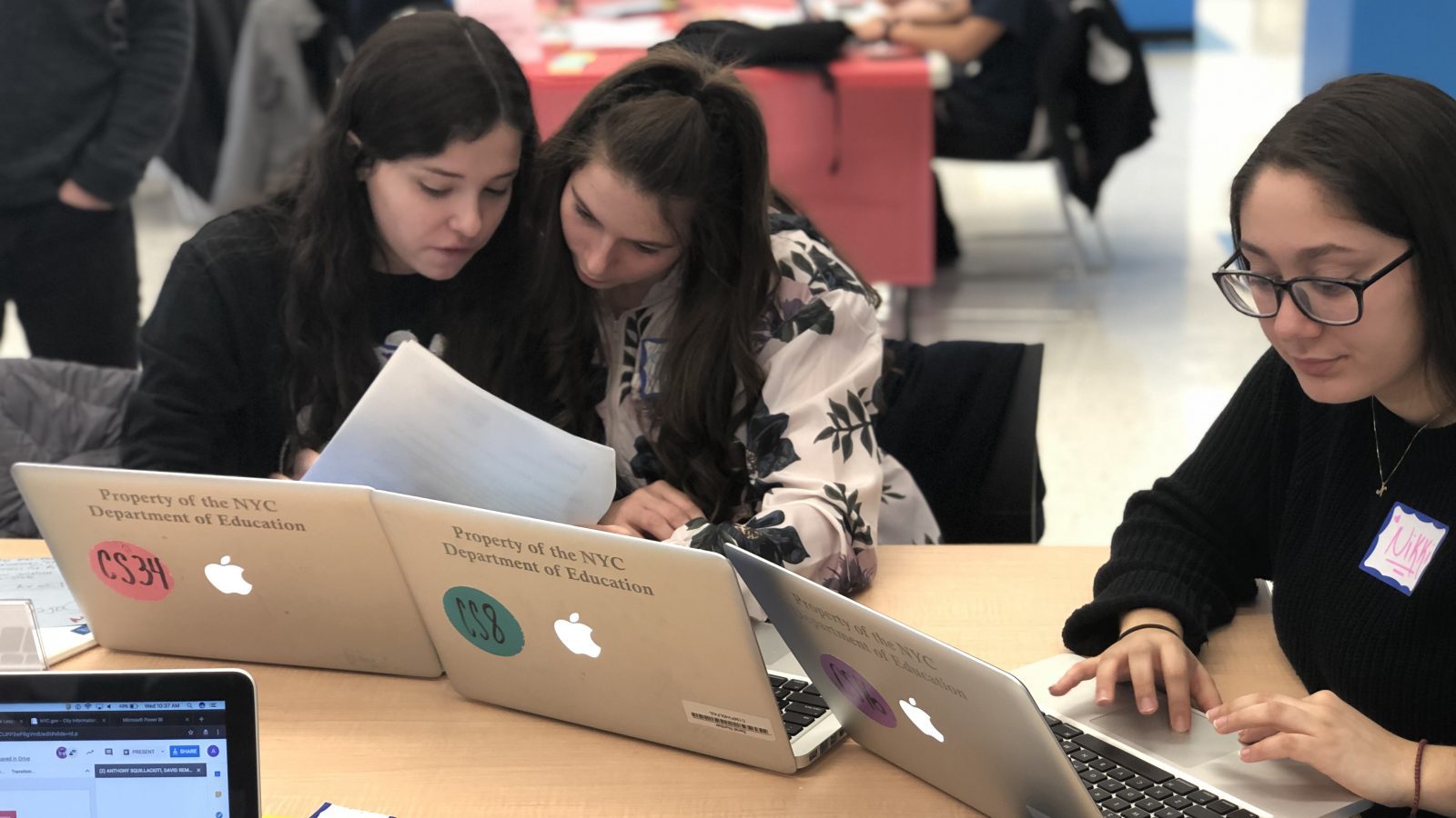 Three CS Students at laptops