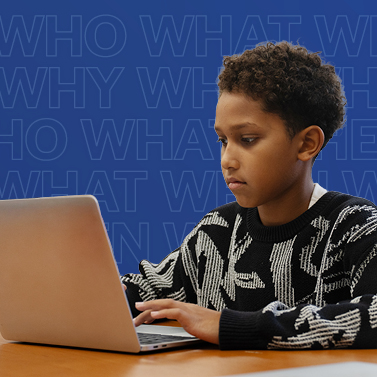 A student uses his laptop