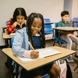 Three students in their classroom