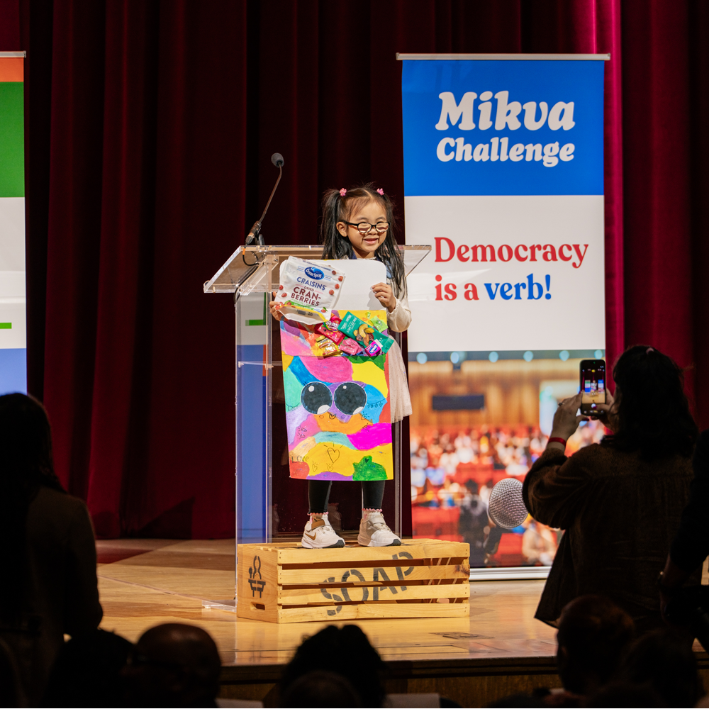 Girl at Podium on Soapbox (SoapboxNYC 2026)