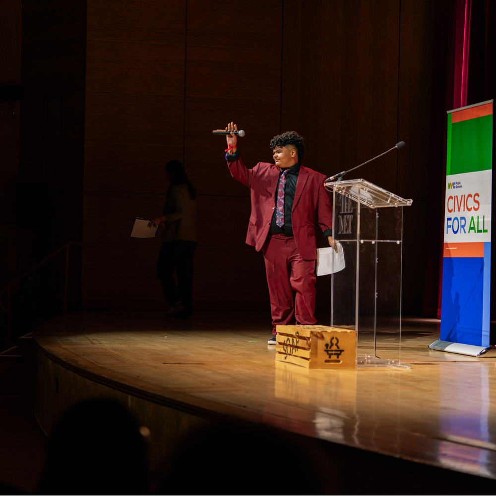Student Waving During Walk to Podium (Soapbox NYC 2026)