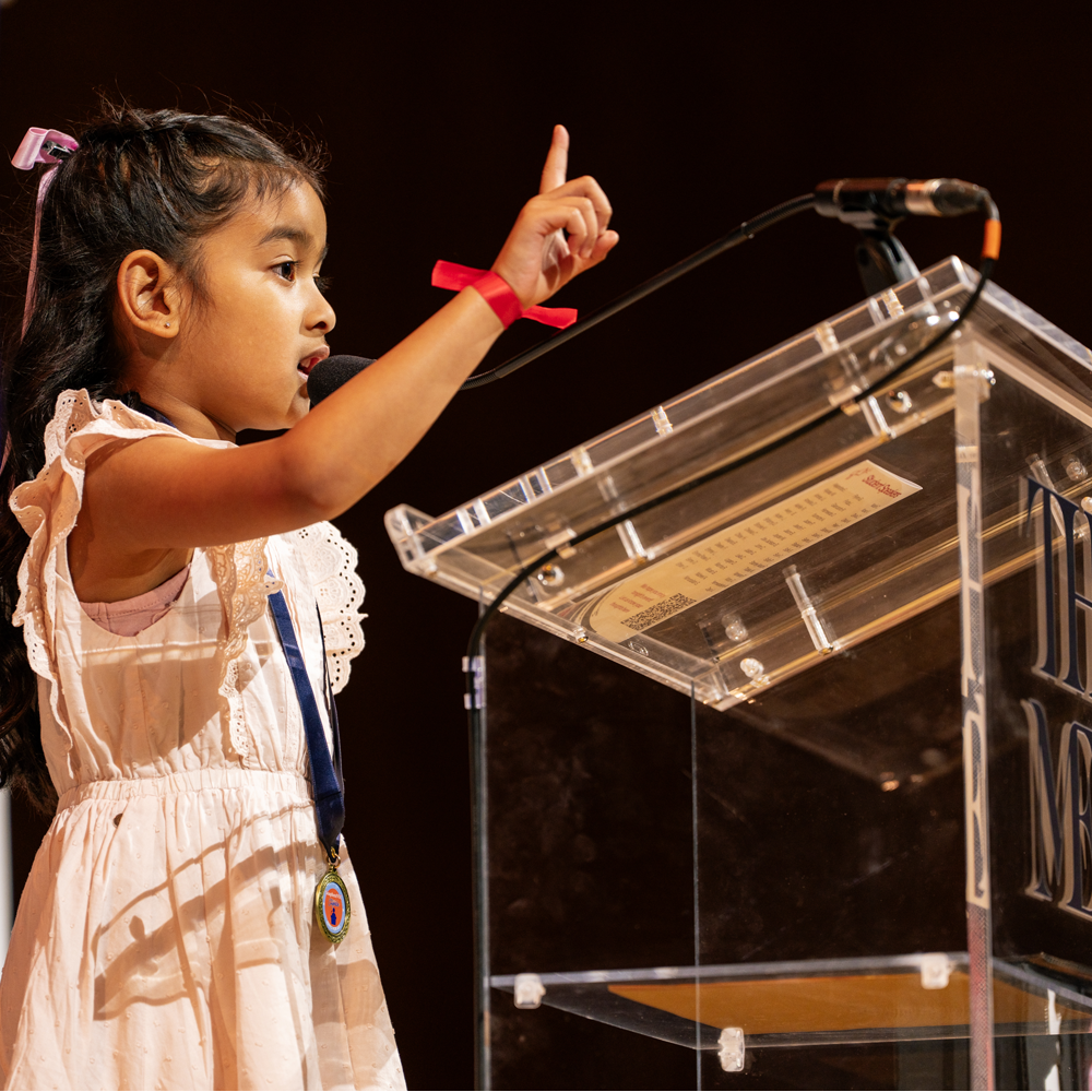 Young Girl at Podium (Soapbox NYC 2026)