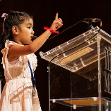 Young Girl at Podium (Soapbox NYC 2026)